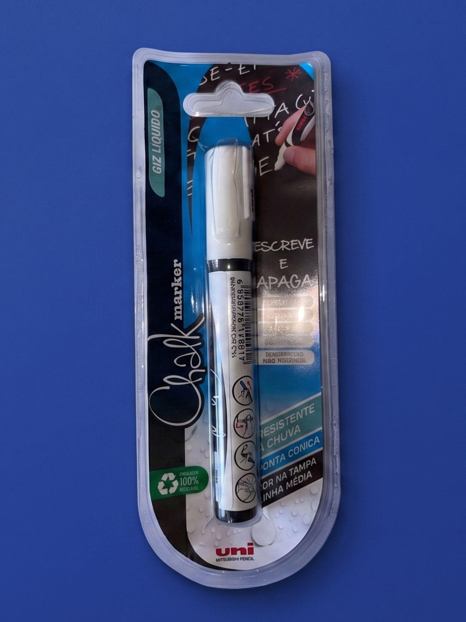 The neat white uni chalk marker that comes in the box, shown on a cobalt background.